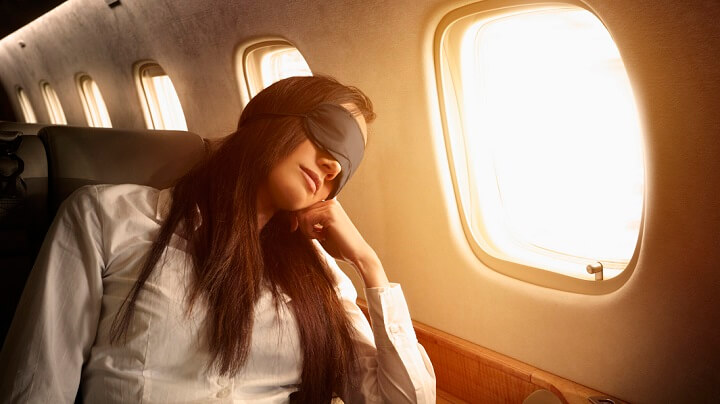 woman-sleeping-plane